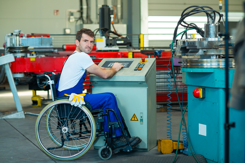 Disabled worker in wheelchair. ID 88686979 © Marko Volkmar | Dreamstime.com